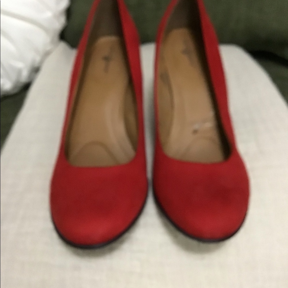 Red suede shoes.